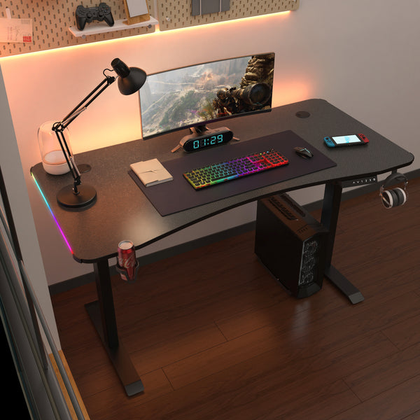 La consola de juegos de Mesa puede subir y bajar la altura y la ergonomía se puede ajustar 140x60cm silla de juegos avanzada con Luz LED